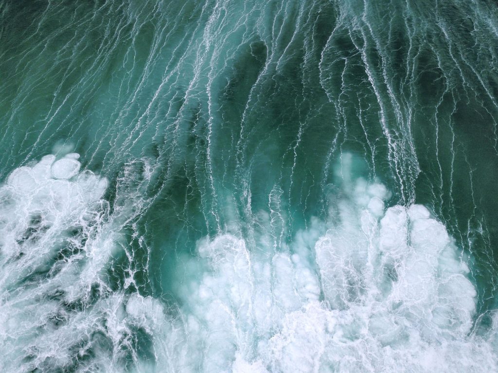 Churned up water with many whitecaps in the sea