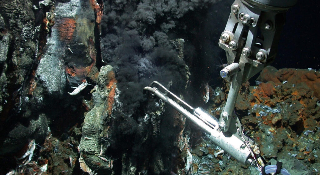 Infrastrukturen: A black smoker is examined by a research instrument
