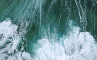 Churned up water with many whitecaps in the sea