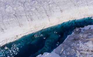 Top view from helicopter of deep lake on 79 North Glacier